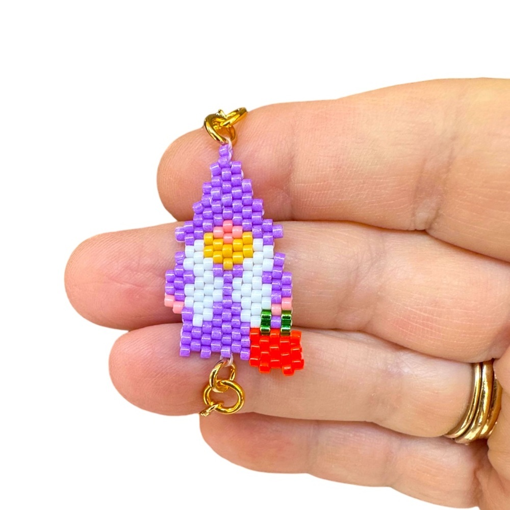 Handcrafted beaded Halloween gnome with pumpkin slider bracelet adjustable